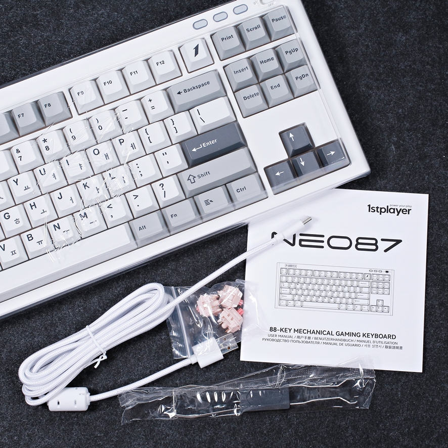 NEO87 box contents with dust cover