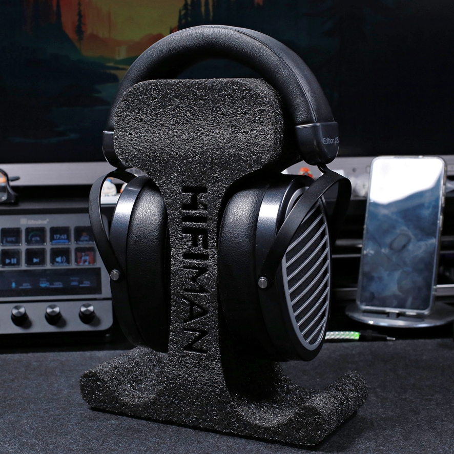 Box insert doubling as a headphone stand