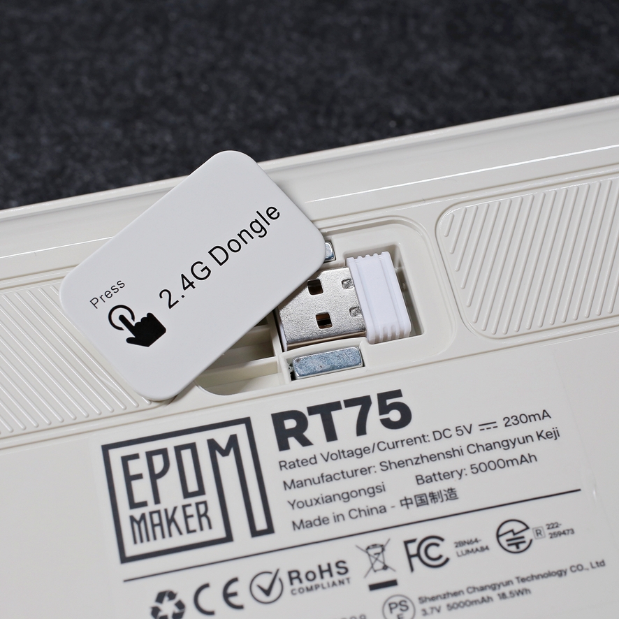 Wireless 2.4GHz USB dongle storage compartment under keyboard