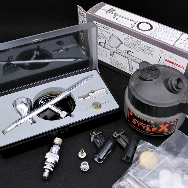 White primer applied to Gunpla model runner
