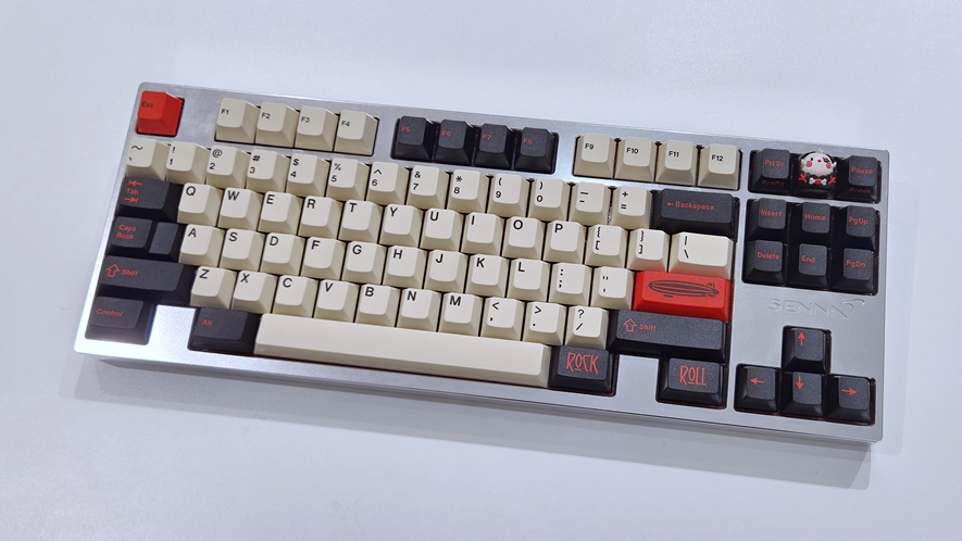 Silver SENA Raw custom keyboard with red accent ESC key