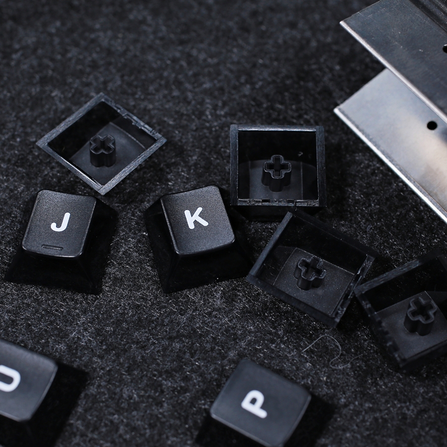 Translucent keycaps showing rounded legend font