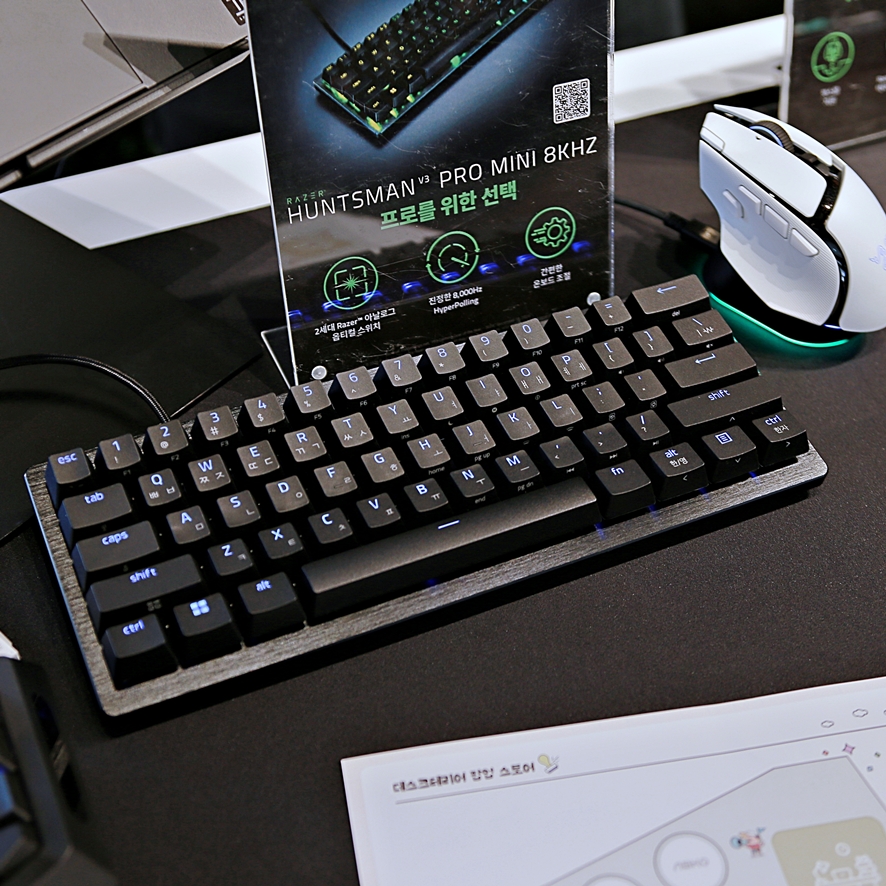 Razer gaming peripherals displayed on a black table