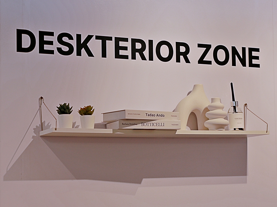 White themed desk setup with pegboard and accessories