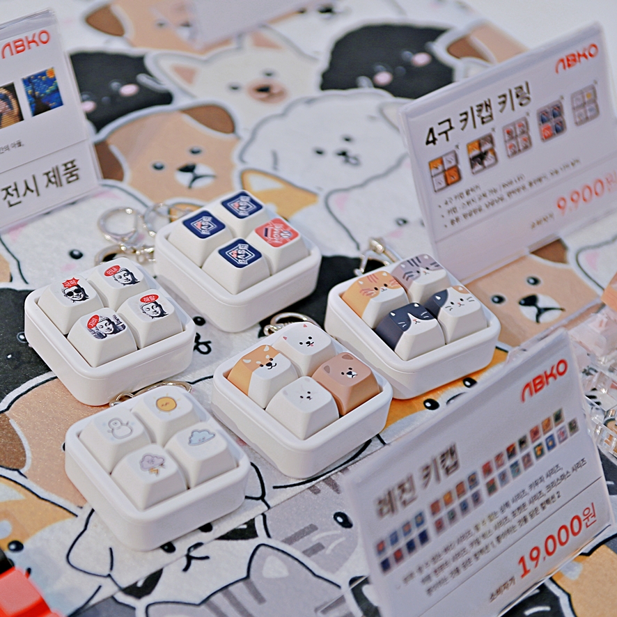 Framed keycaps and custom accessories on display