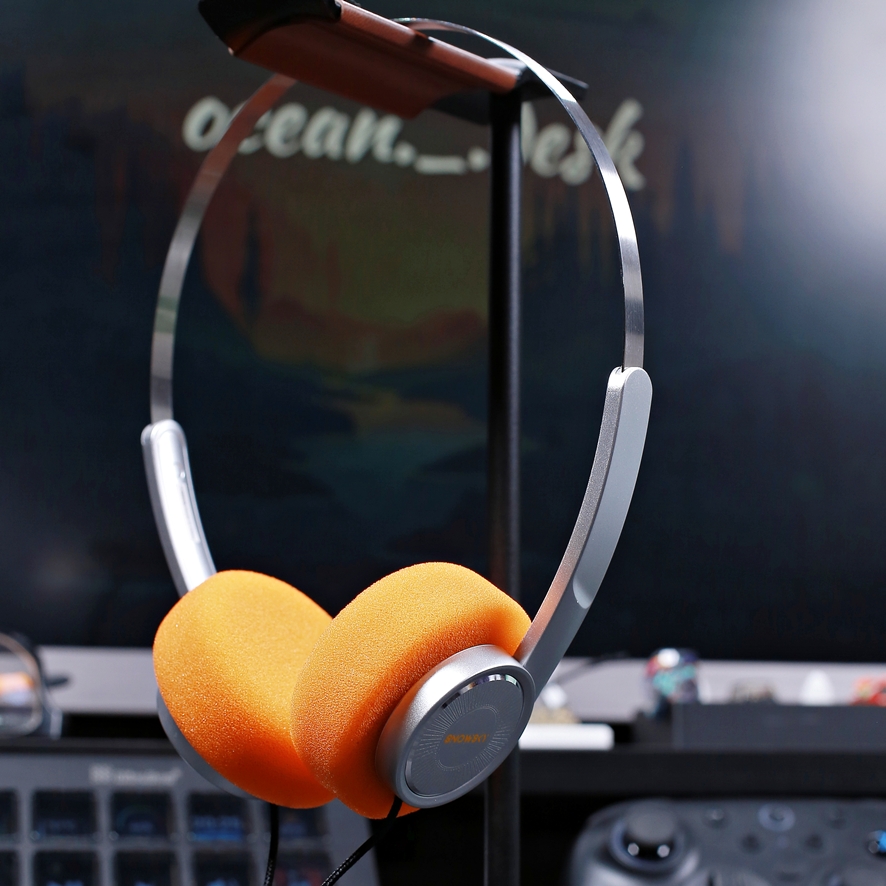 Slender stainless steel headband and swivel earcups
