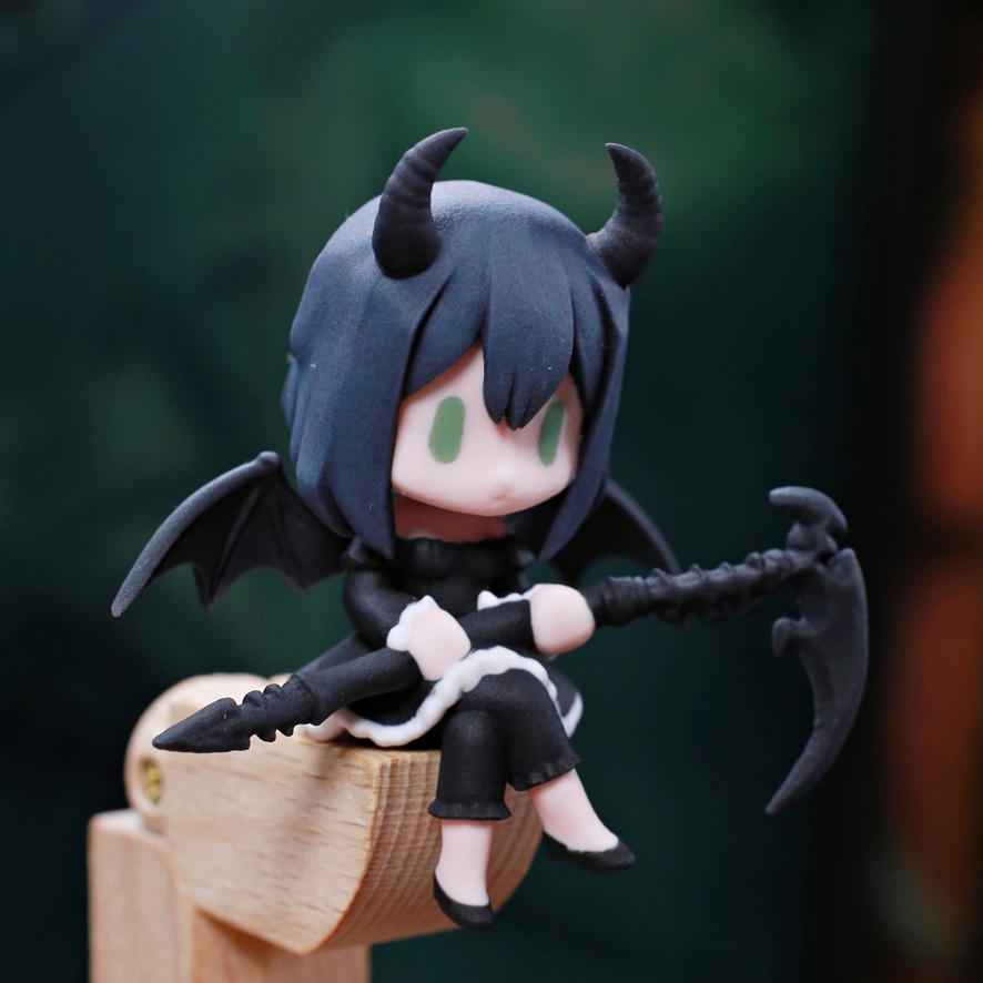 Close-up of custom Dead Master figure details and scythe