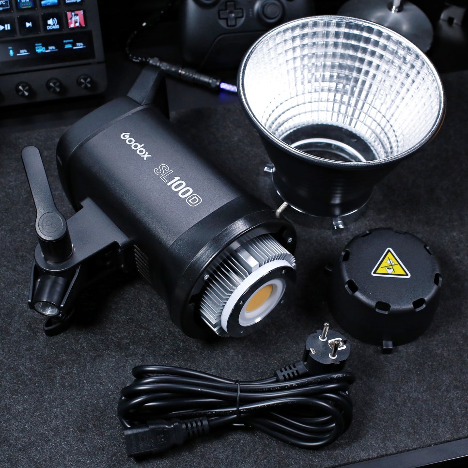 Godox SL100D key light positioned near camera setup