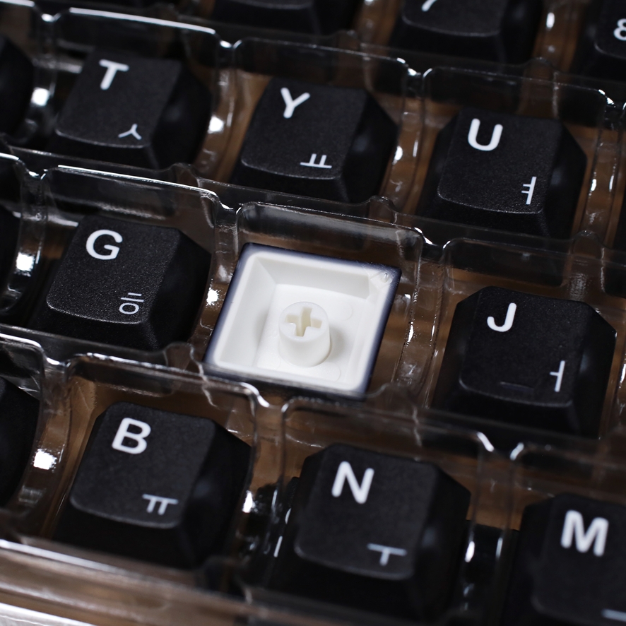 Tomak 79 PBT dye-sub WOB keycaps closeup