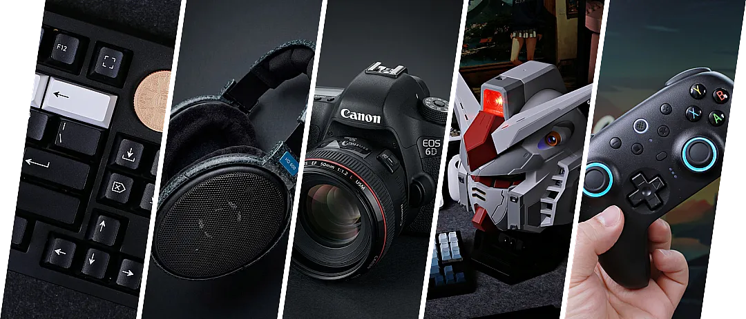 Mechanical keyboard, Sennheiser HD 600 headphones, Canon EOS 6D with a 50mm lens, a Gundam head figure, and a game controller